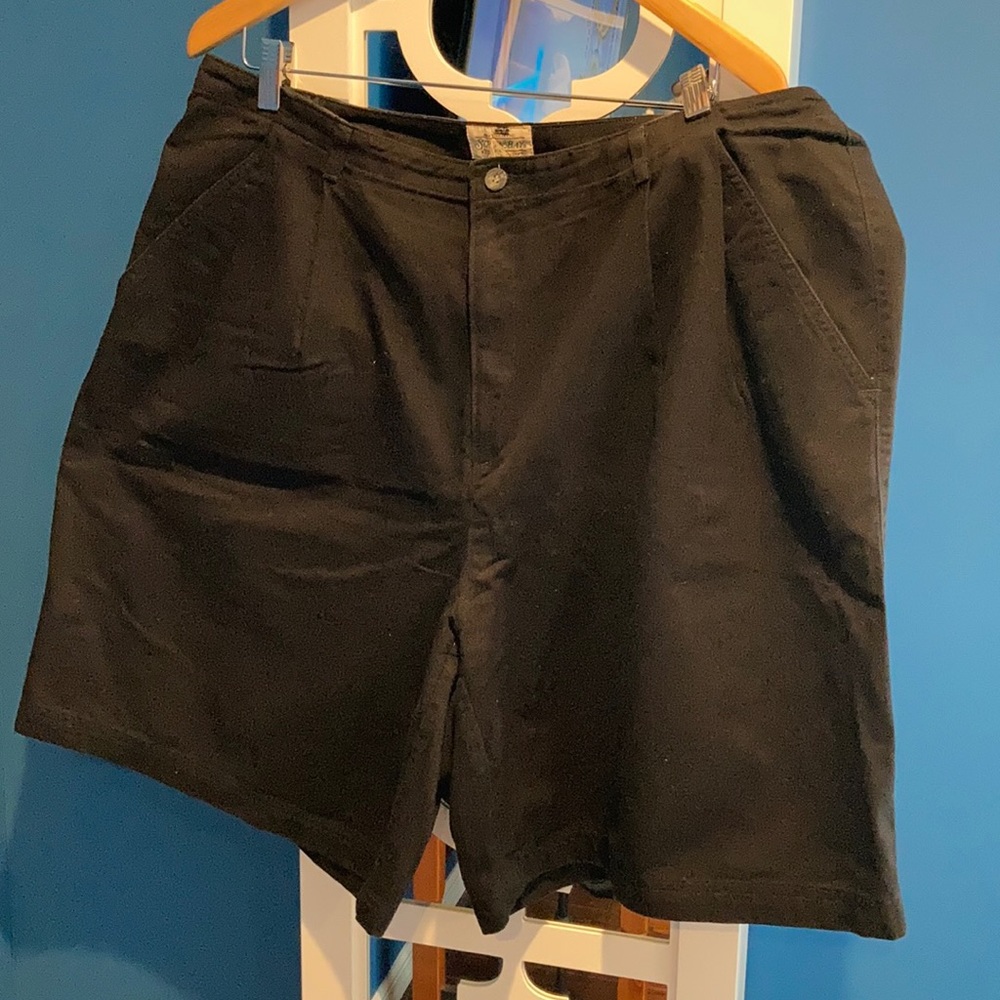 Women’s black shorts pleated front belt loops